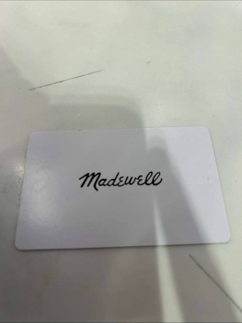 Madewell White Card with Black Script Logo